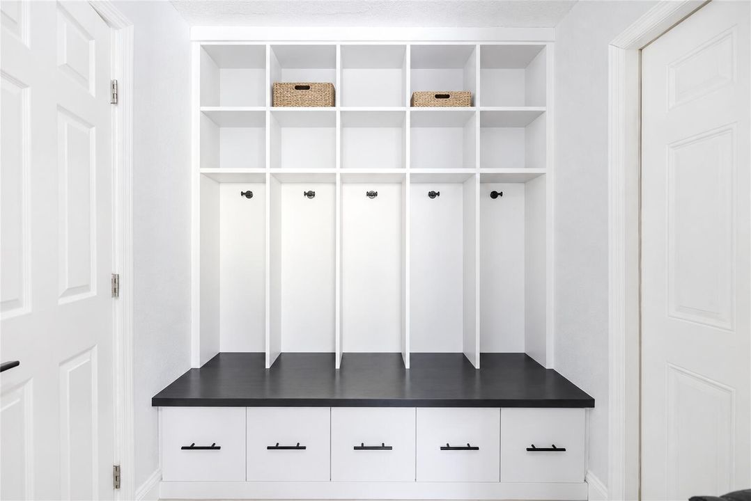 Minimalist White Mudroom Storage Built-I