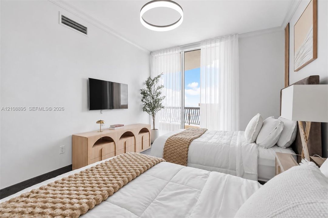 Bedroom featuring floor-to-ceiling glass sliding doors, private balcony access, modern circular LED ceiling fixture, and neutral wall finishes