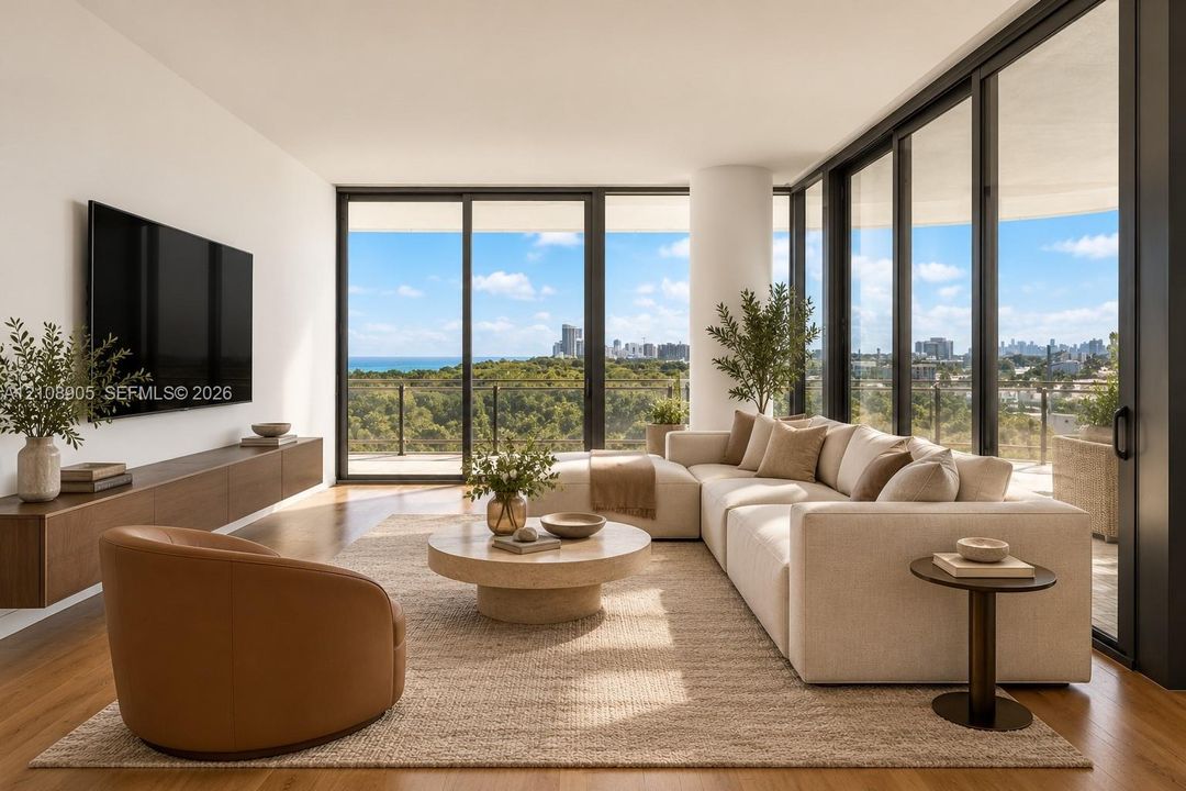 Floor-to-ceiling glass walls, wood-finish flooring, built-in wall-mounted cabinetry, and a wraparound balcony