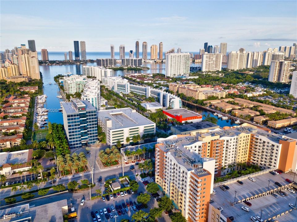 Aerial perspective featuring waterfront placement, canal access, and proximity to the coastline