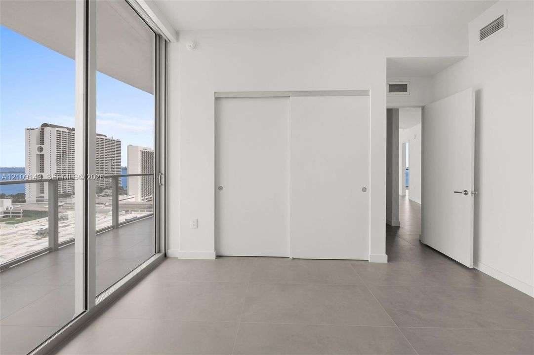 The secondary bedroom even has balcony access