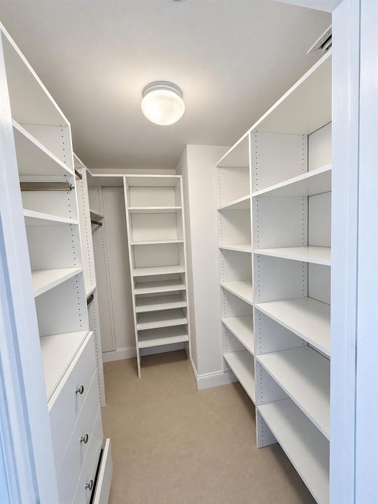 GUEST BEDROOM'S WALK IN CLOSET