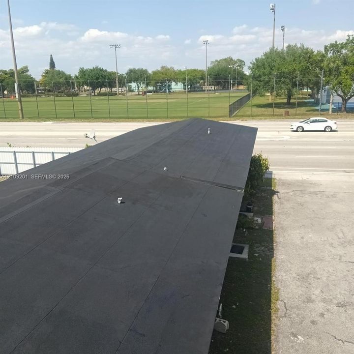 Flat roof with a black membrane finish