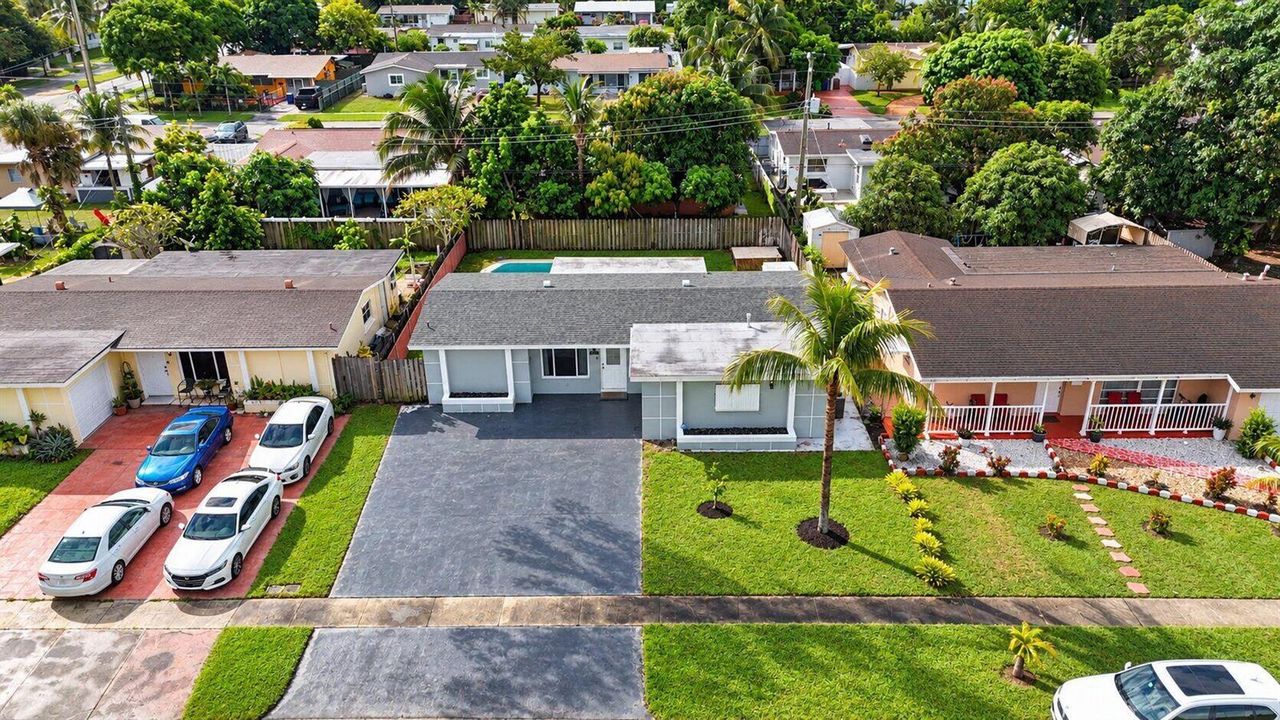 4-web-or-mls-Aerial Sunny Suburban Ranch