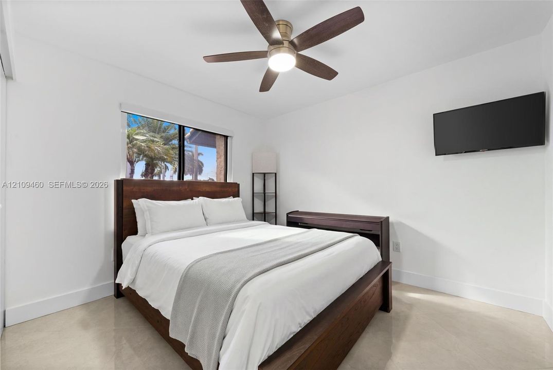 Bedroom with garden-view window