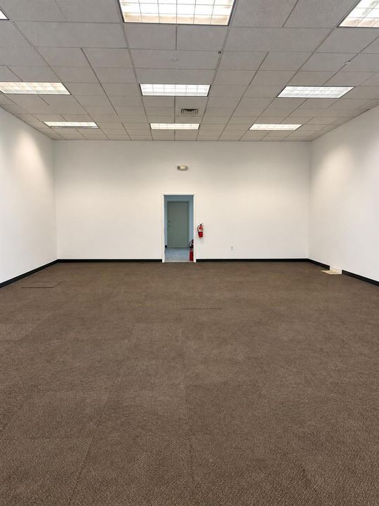 Vacant Commercial Interior with Fire Ext