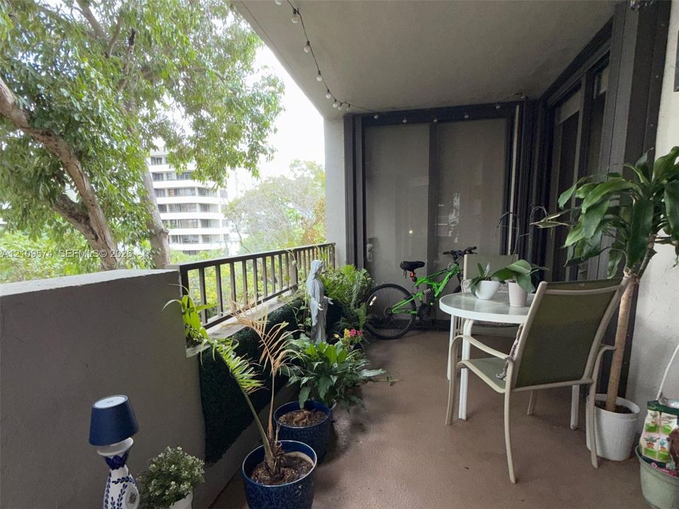Covered balcony access from living room and bedrooms
