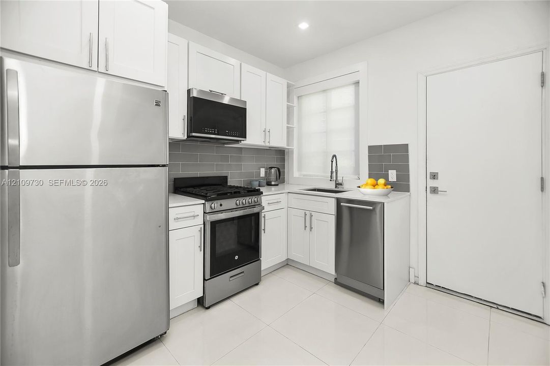 Kitchen View from Entryway - Brand New Stainless Steel Appliances