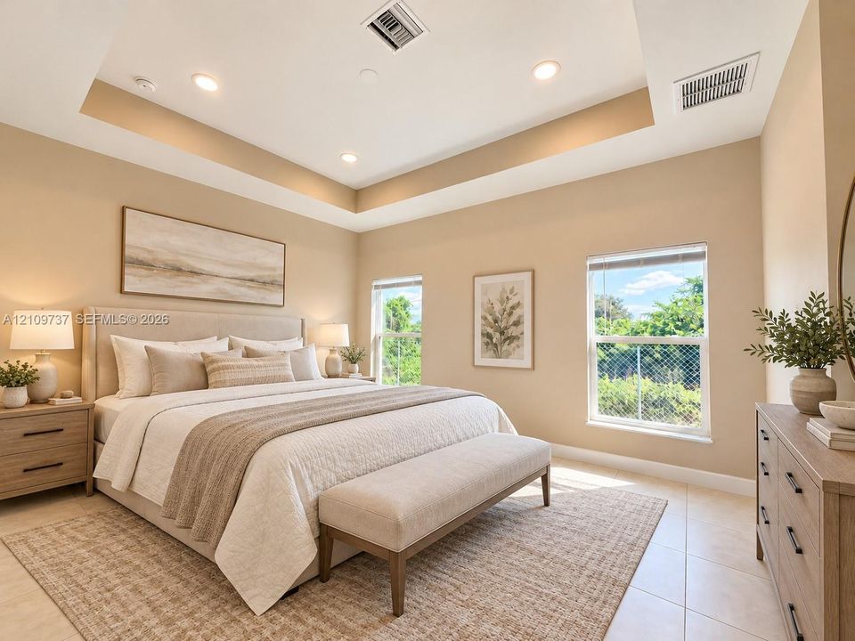 Tray ceiling, recessed lighting, and large windows with exterior landscape exposure, finished with light-toned floor tiling