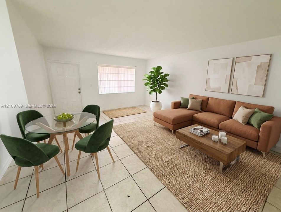 Open-concept area featuring light-toned tile flooring, neutral walls, and a recessed window with vertical blinds