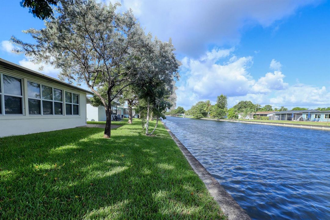 Wide Canal Views and Mature Trees