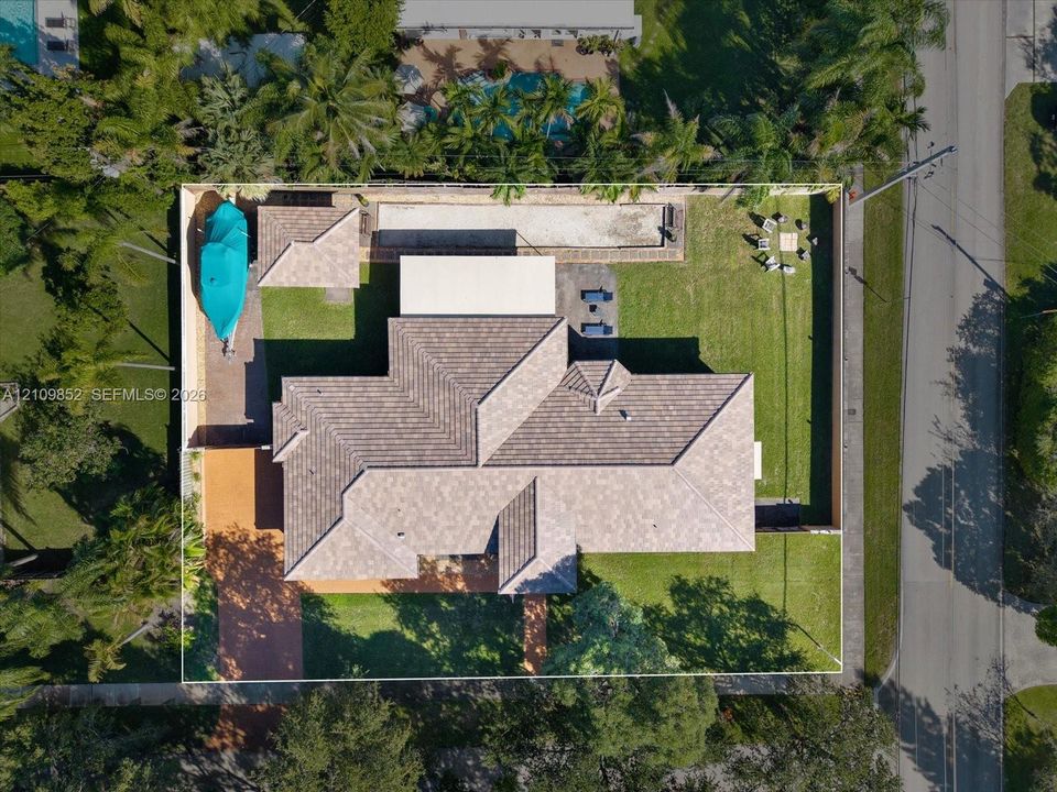 Another aerial perspective * note the bocce court and plenty of room for a future pool *