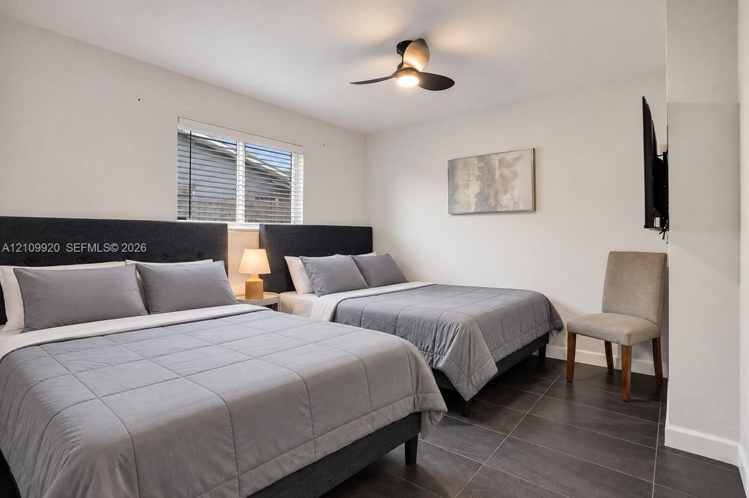 Residence 1753 (Right Side) – Bedroom 2 spacious with large closet.