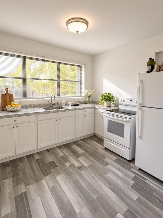 Kitchen featuring white cabinetry, stone-finish countertops, wood-finish flooring, a stainless steel undermount sink with a gooseneck faucet, and a large horizontal window