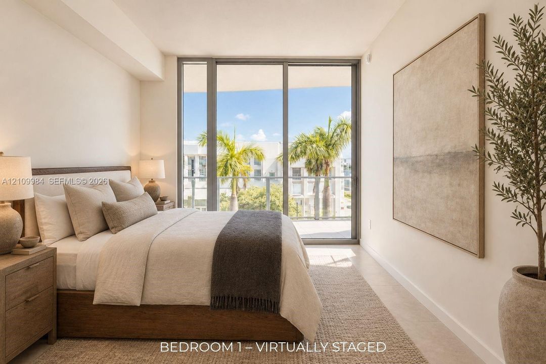 Floor-to-ceiling glass sliding doors, private balcony, neutral wall finishes, and light-toned hard-surface flooring