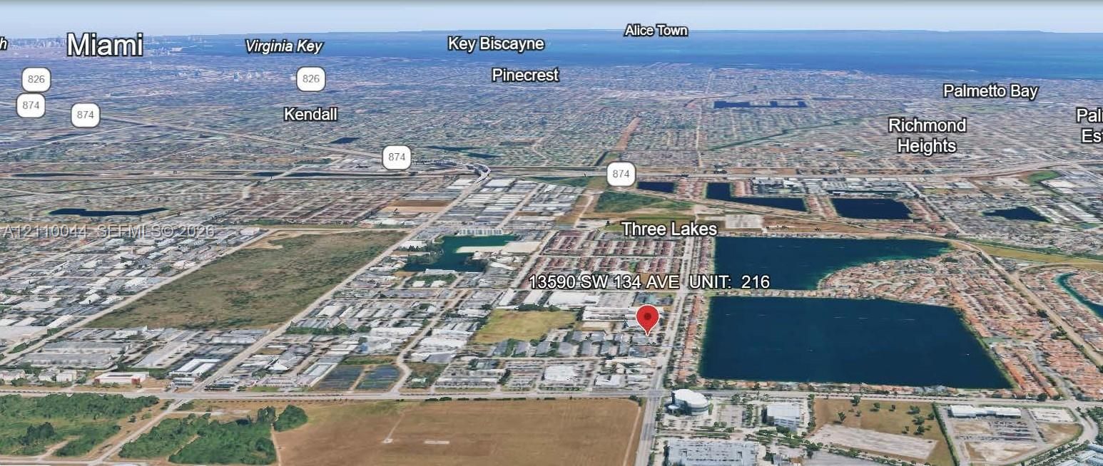 Aerial perspective of the property location featuring proximity to regional thoroughfares and water features