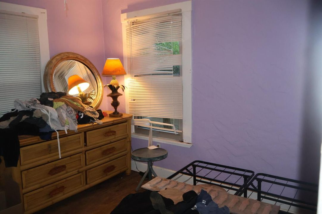 Bedroom With Dresser and Mirror