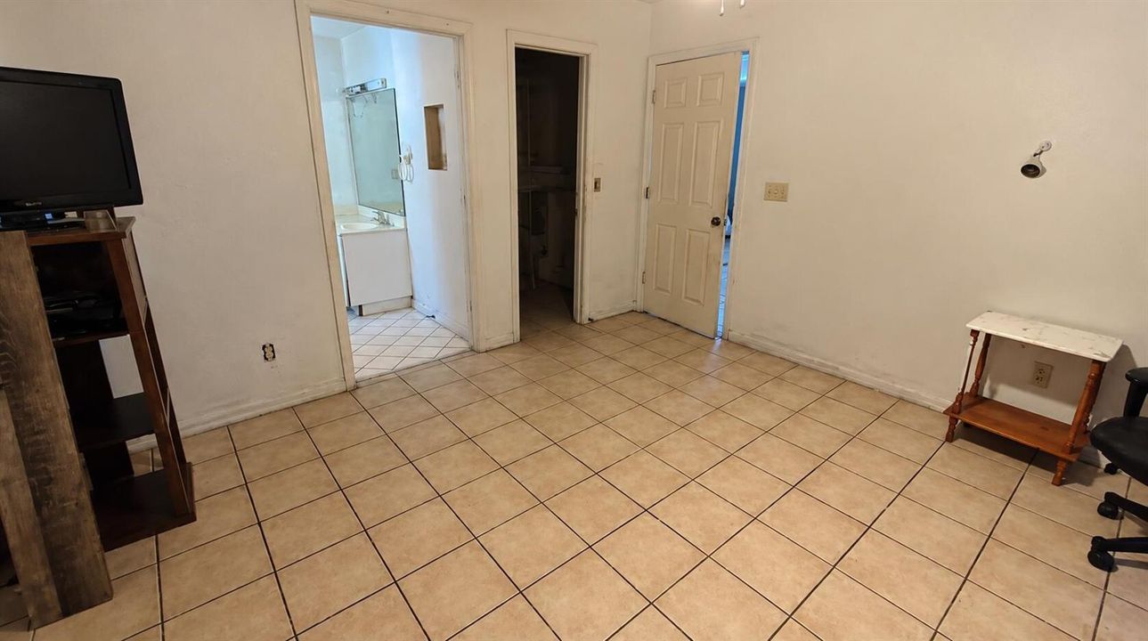 Empty Room with Three Doorways