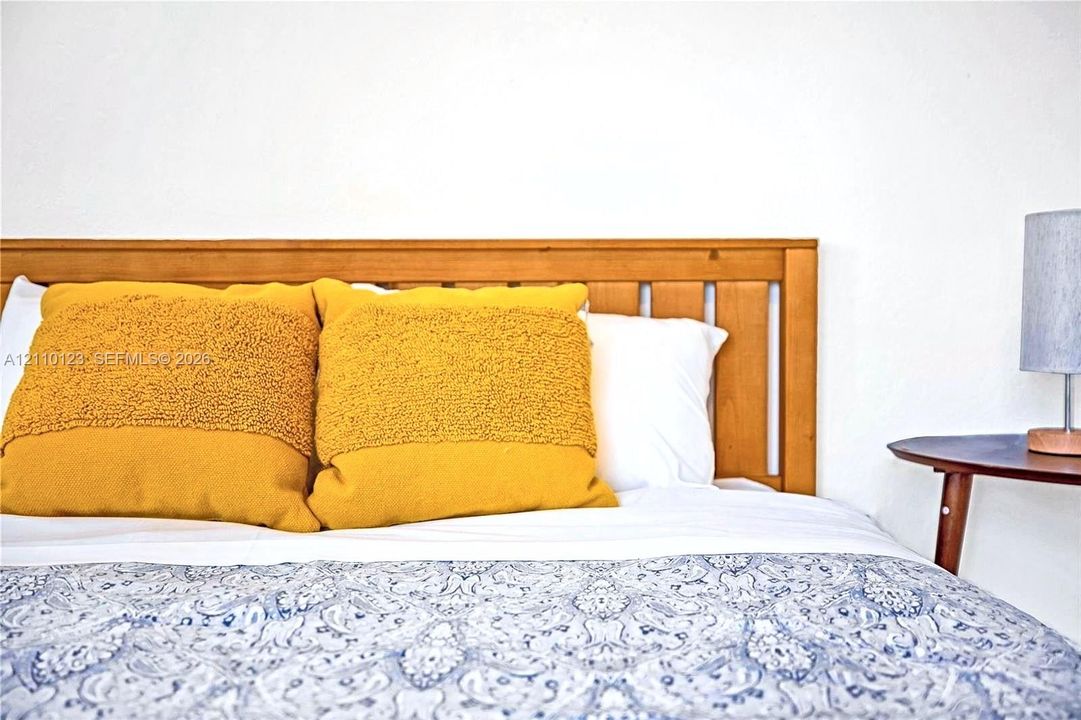 Natural wood-finish spindle headboard