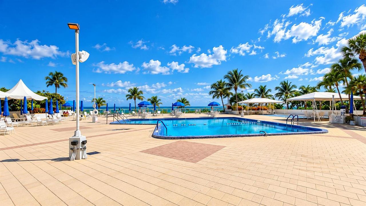 Sunlit Tropical Oceanfront Resort Pool