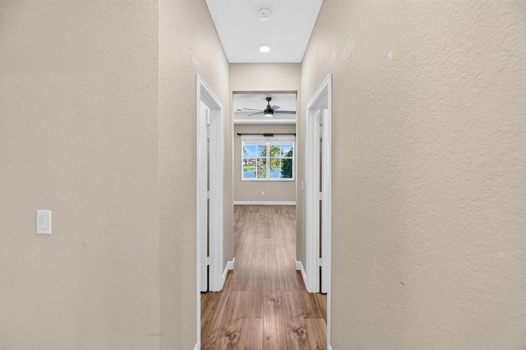 35-web-or-mls-Primary bedroom hallway 1