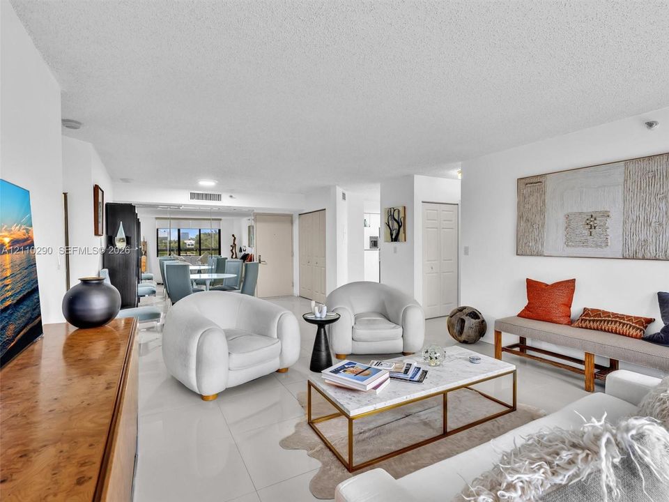 Spacious Living Area with Pool and Intracoastal Views and Updated Flooring