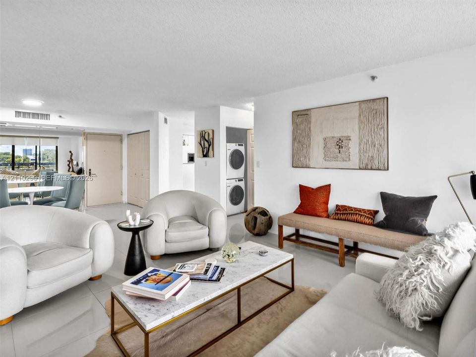 Spacious Living Area with Pool and Intracoastal Views and Updated Flooring