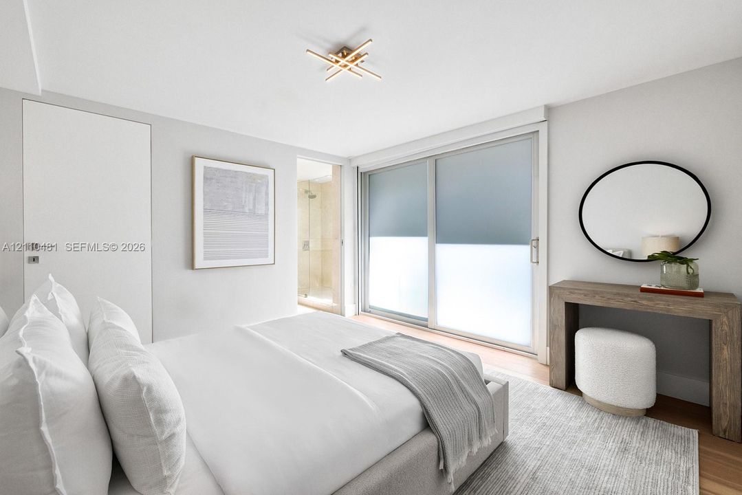 Sliding glass door, flush-mount multi-arm geometric light fixture, wood-finish flooring, and crisp neutral wall palette