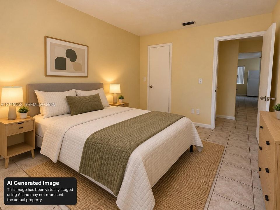Neutral-toned interior featuring ceramic tile flooring and a standard swing door
