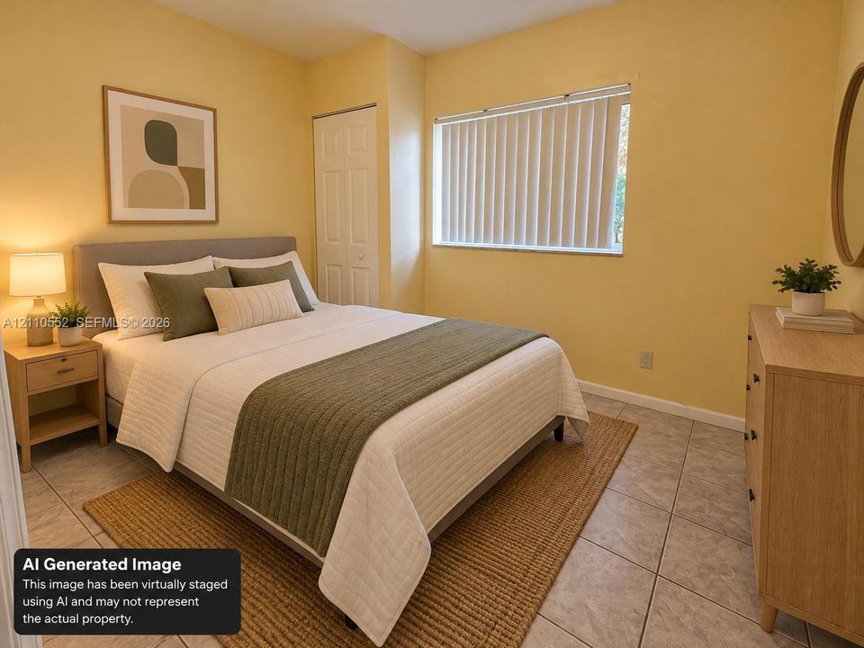 Interior room featuring large-format ceramic tile flooring, a window with vertical blinds, and a built-in closet with a paneled door