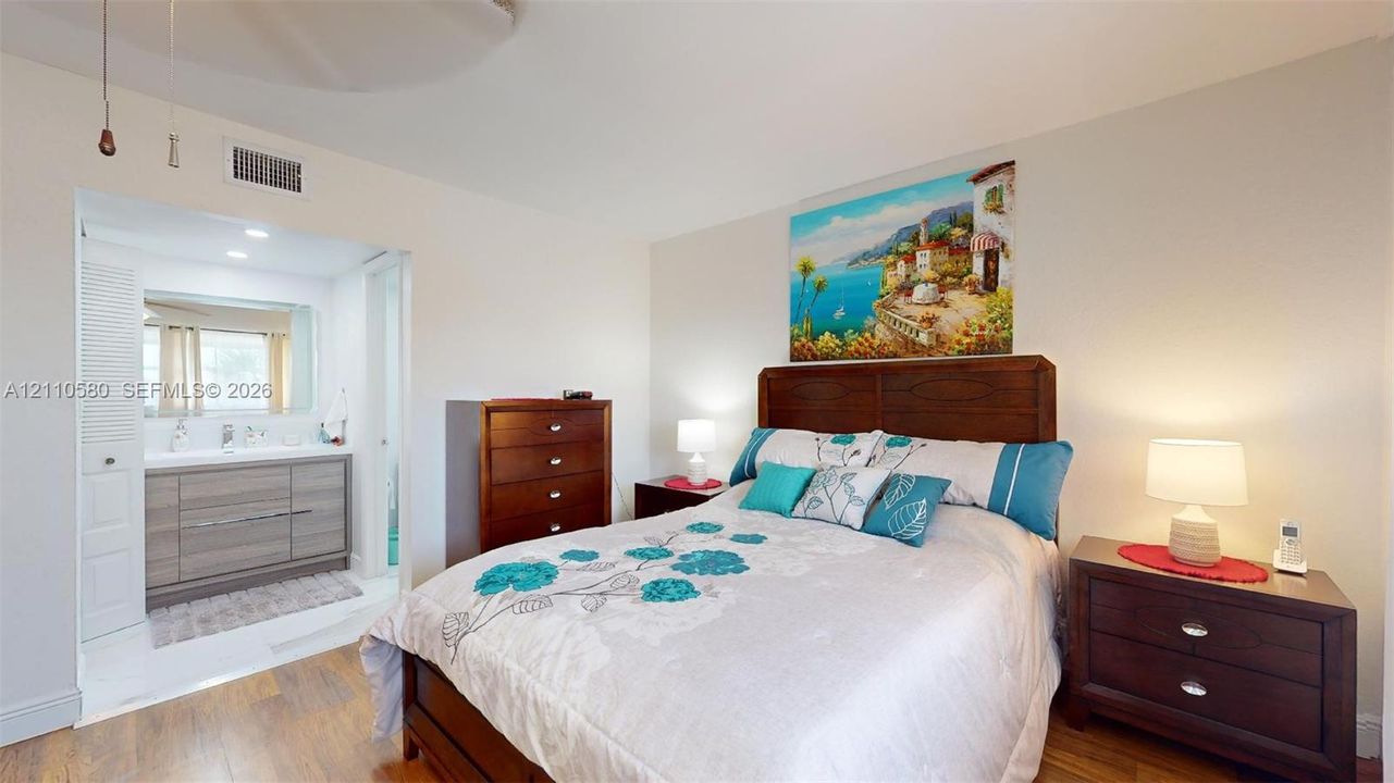 Interior space featuring wood-finish flooring and a neutral color palette