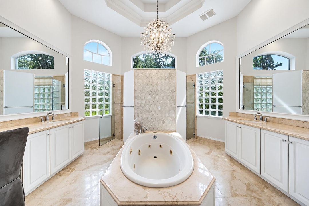 Symmetrical Luxury Spa Bathroom with Cha