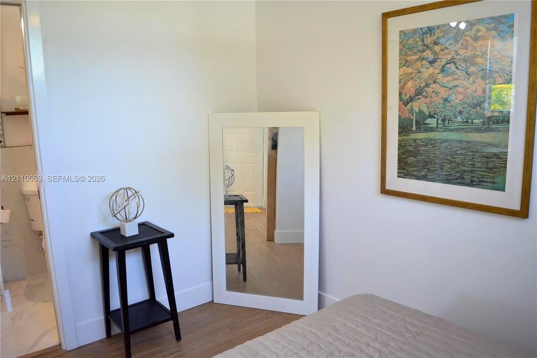 Wood-finish flooring and neutral wall color palette