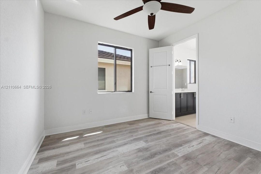 Bedroom #4 Features Jack-and-Jill bathroom access, conveniently shared with the adjoining bedroom