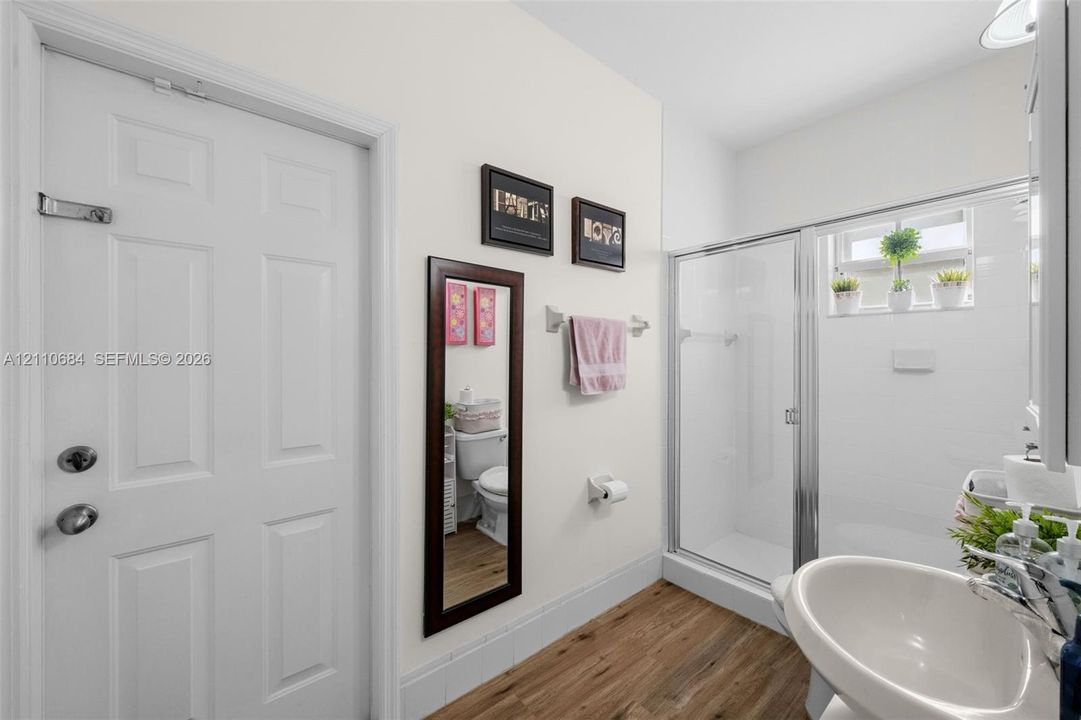 1st floor full bath, also a cabana bath with access to the patio