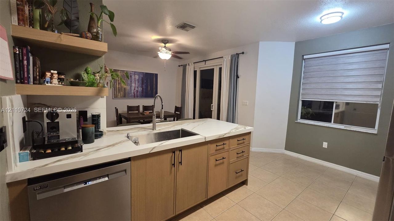 Laundry area featuring dedicated water hookups and wall-mounted electrical panel