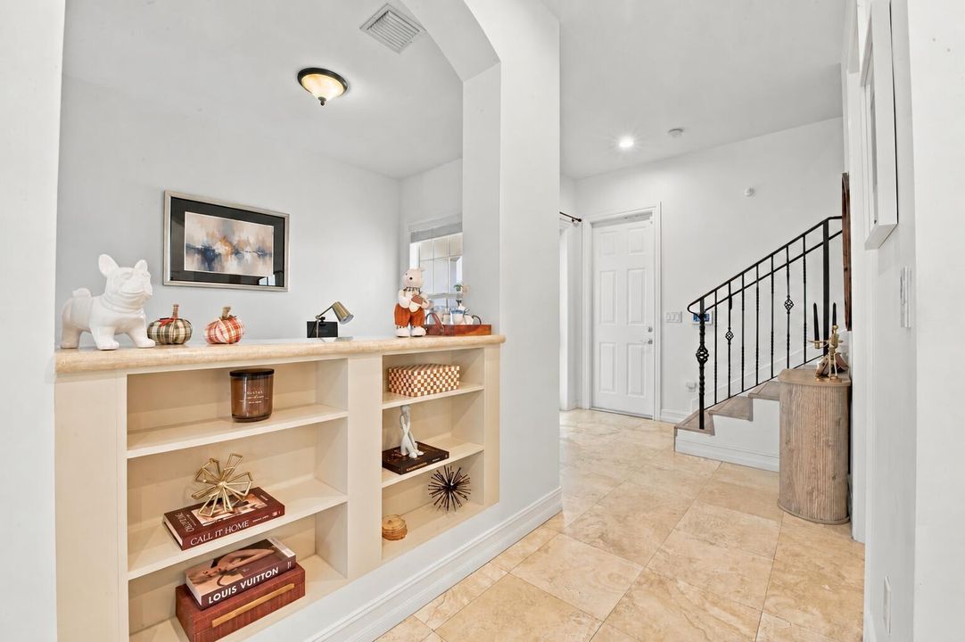 Contemporary abstract art above built-in