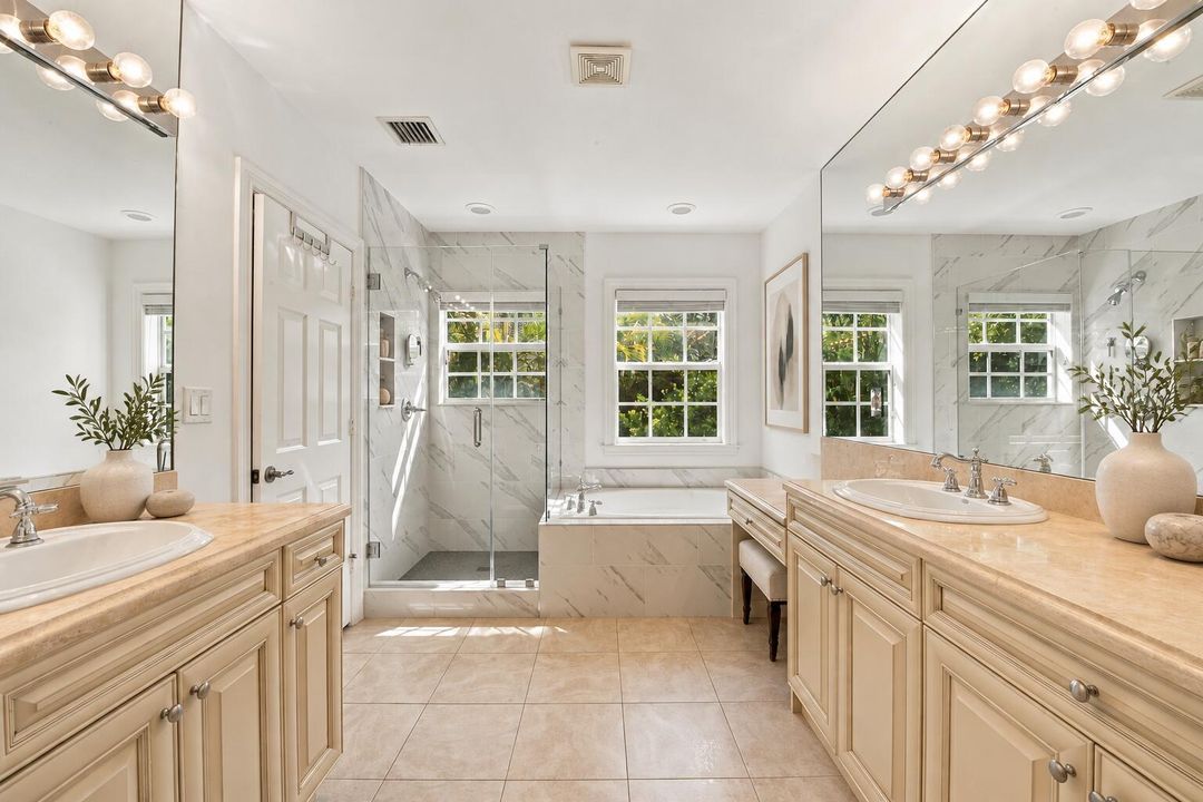 Primary bathroom with sculptural accents