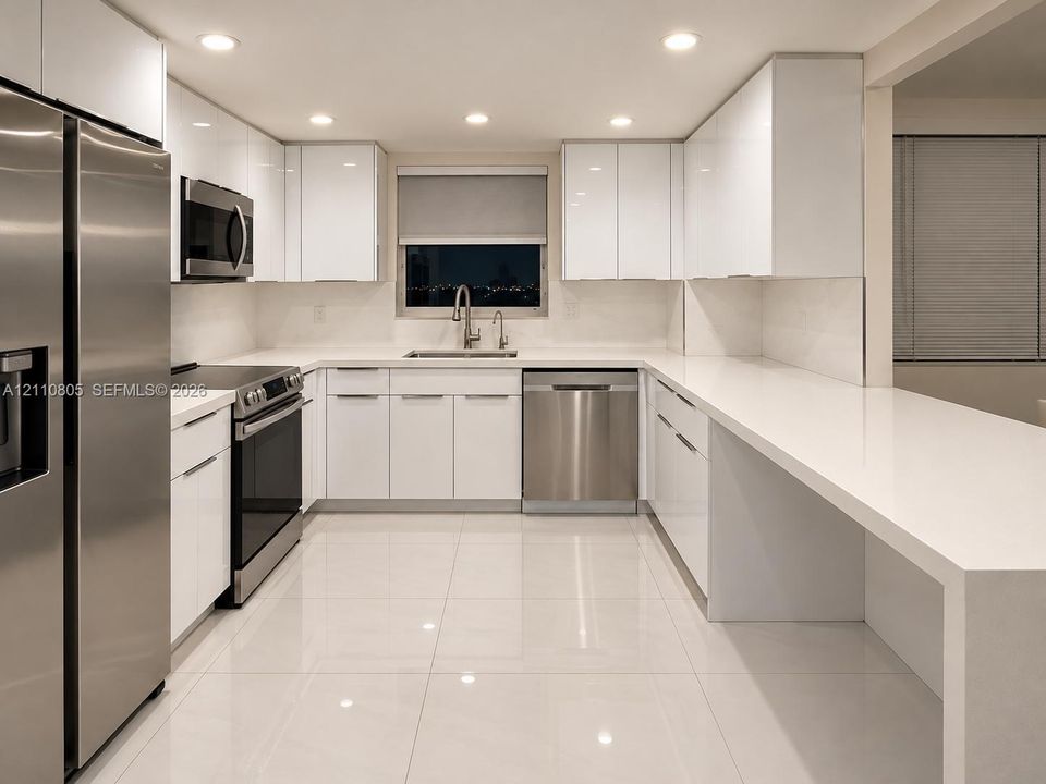 Kitchen featuring white gloss cabinetry, stainless steel appliances, solid surface countertops, recessed lighting, and tile flooring