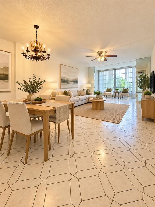 STAGED Open-concept area featuring geometric patterned tile flooring, a multi-arm metal chandelier, a ceiling fan with integrated lighting, and floor-to-ceiling windows
