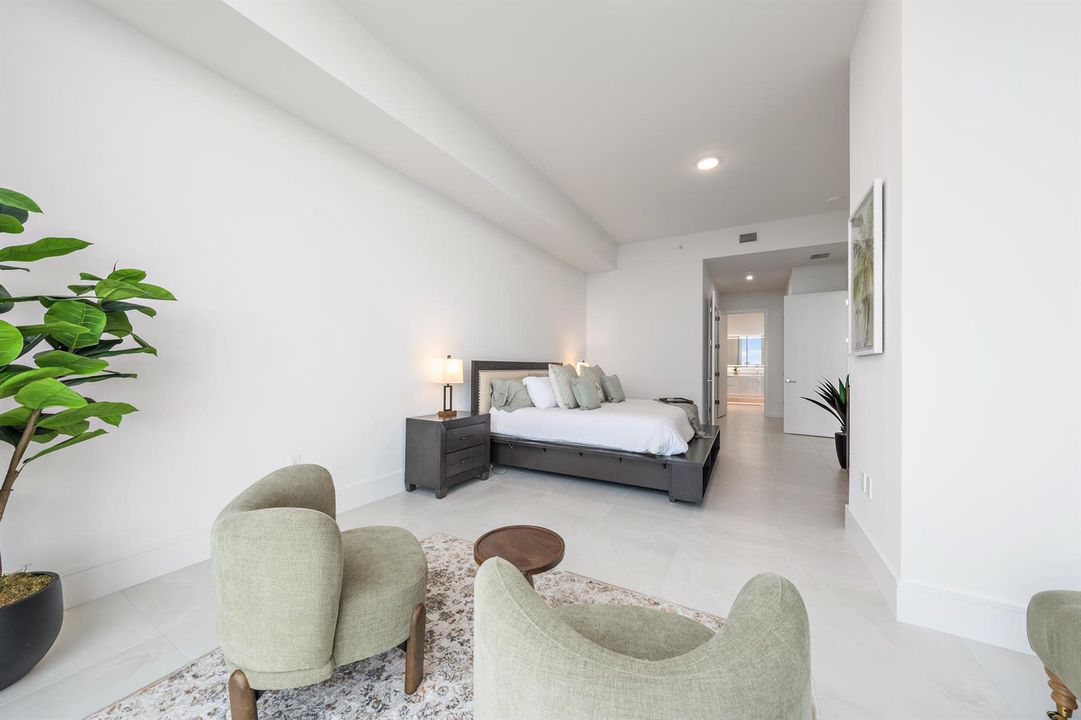 Primary Bedroom + Sitting Area