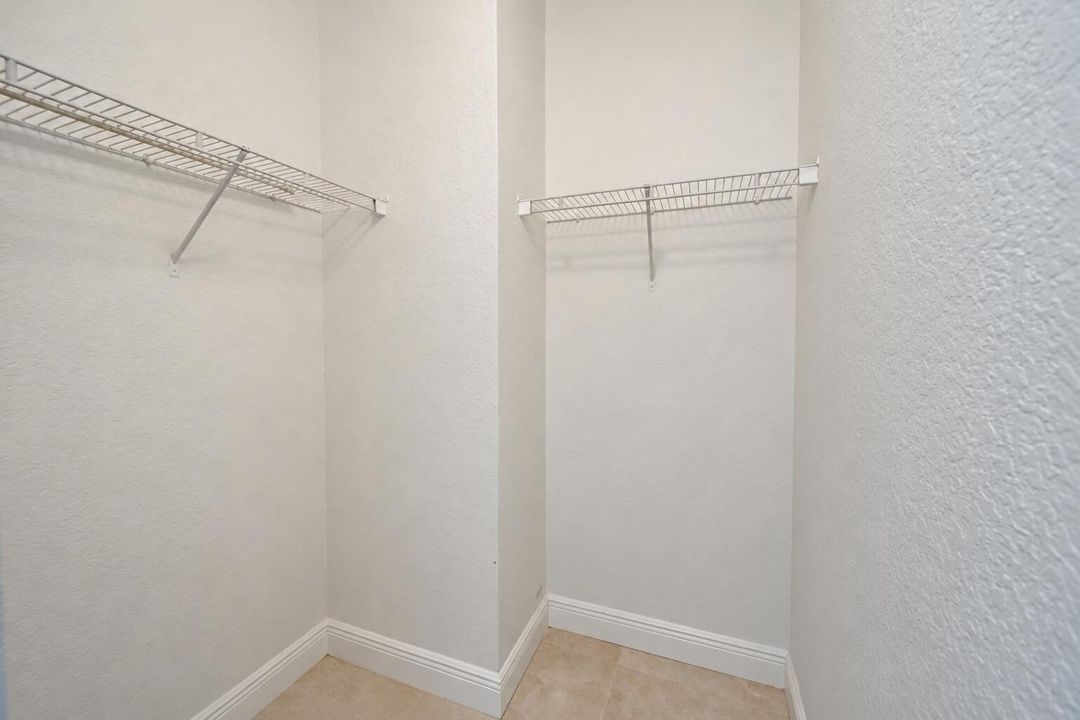 Minimal Empty Closet with Wire Shelving