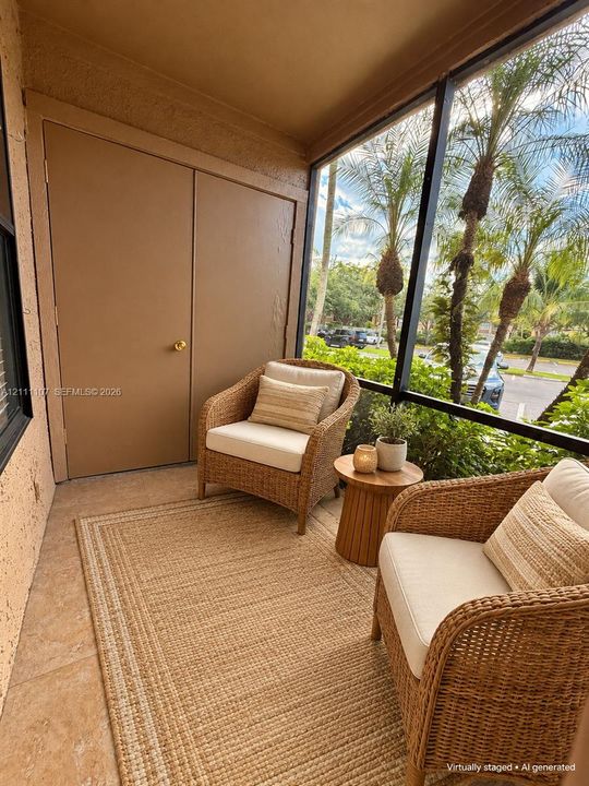 Screened-in patio featuring tile flooring and an integrated storage closet