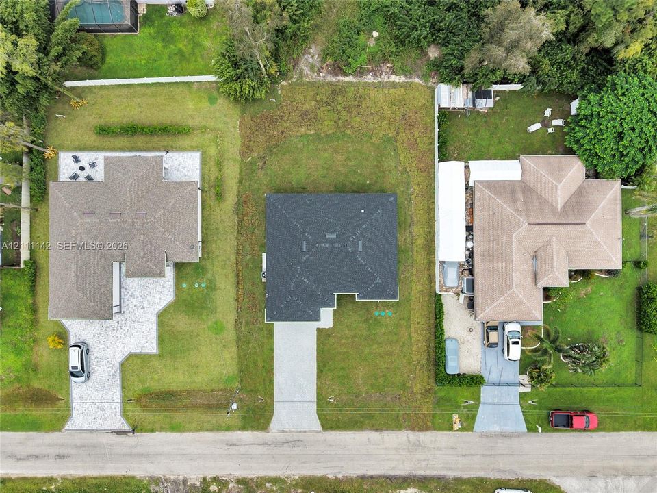 Overhead aerial view of the home and lot.