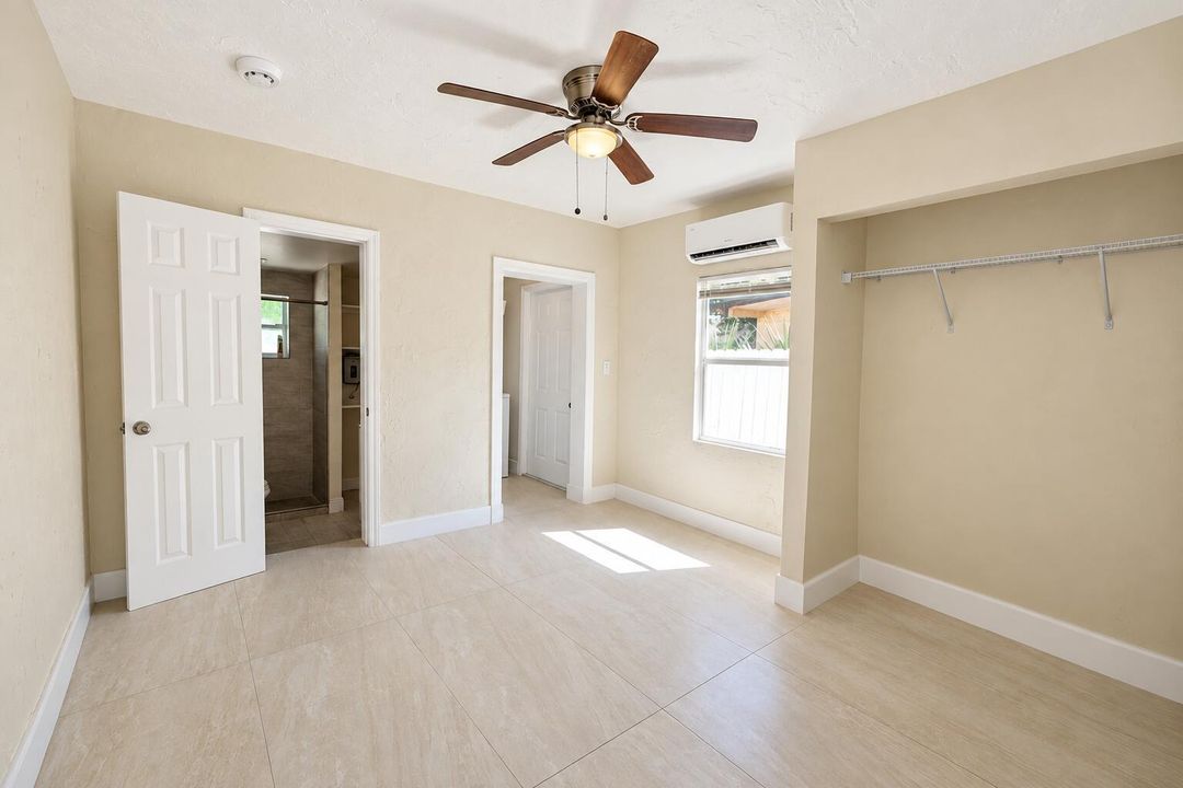 Bright Empty Room with Sunlit Tiles