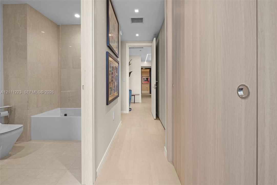3rd bedroom entrance hallway & bath