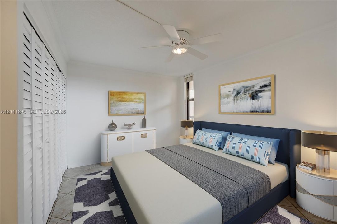 Bedroom featuring tile flooring, white louvered-style closet doors, and a ceiling-mounted light fixture with fan