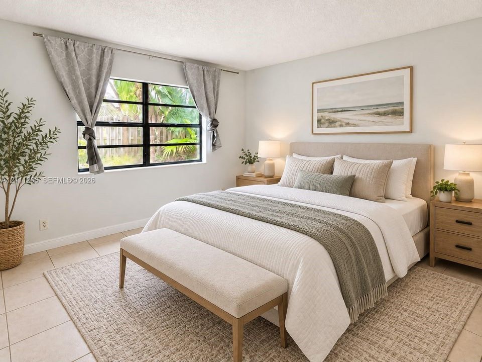 Neutral-toned ceramic tile flooring, horizontal grid-pane window, and textured walls