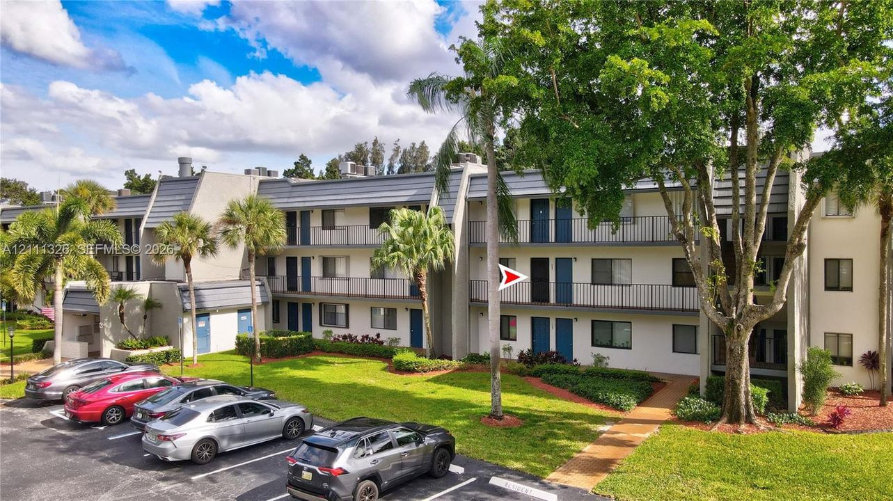 This is the front of the building with a red arrow showing the location of the unit.