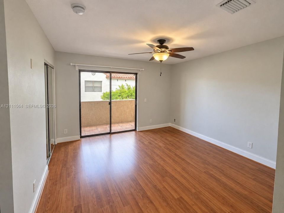 Primary Bedroom w/ Balcony (Upstairs)